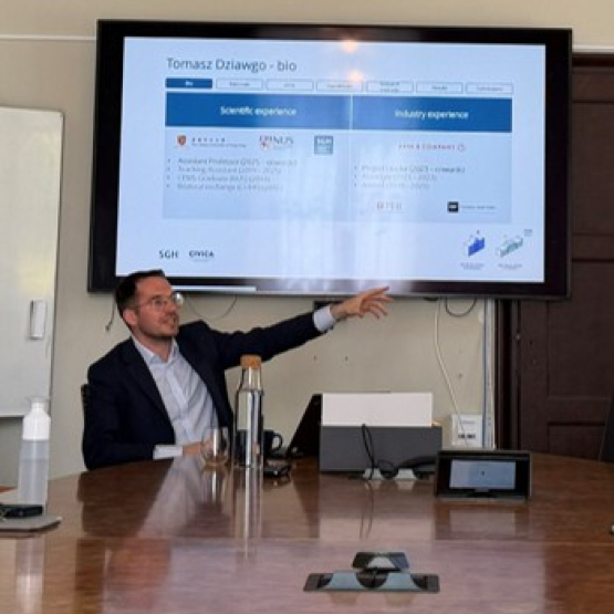 a man pointing out the screen