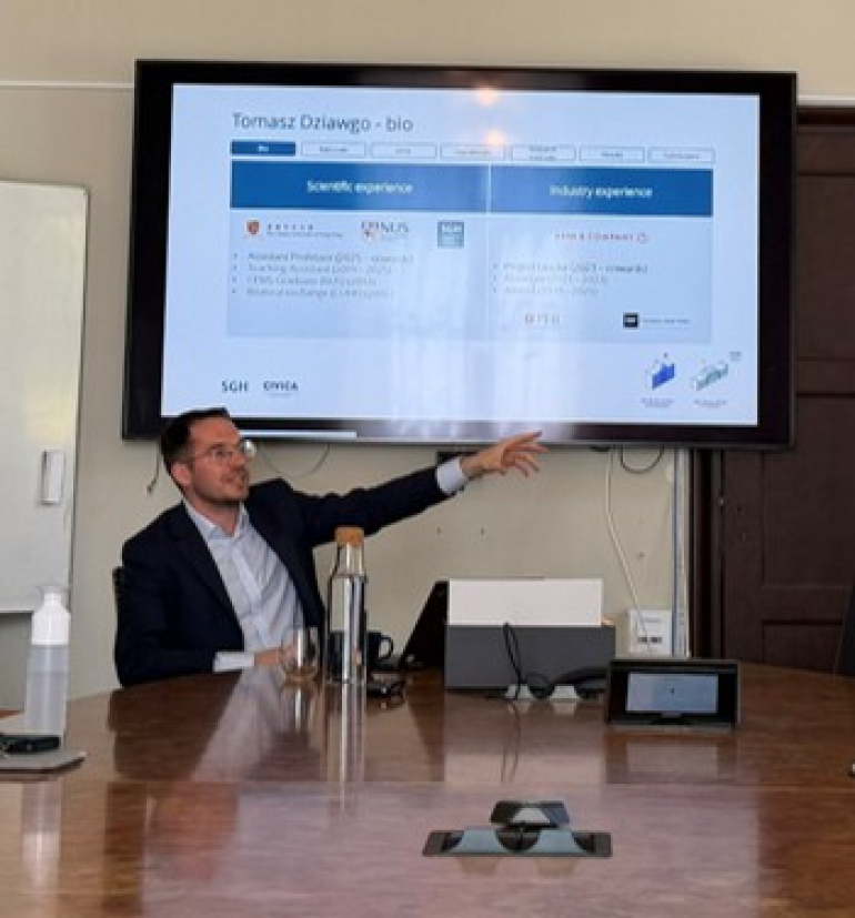 a man pointing out the screen